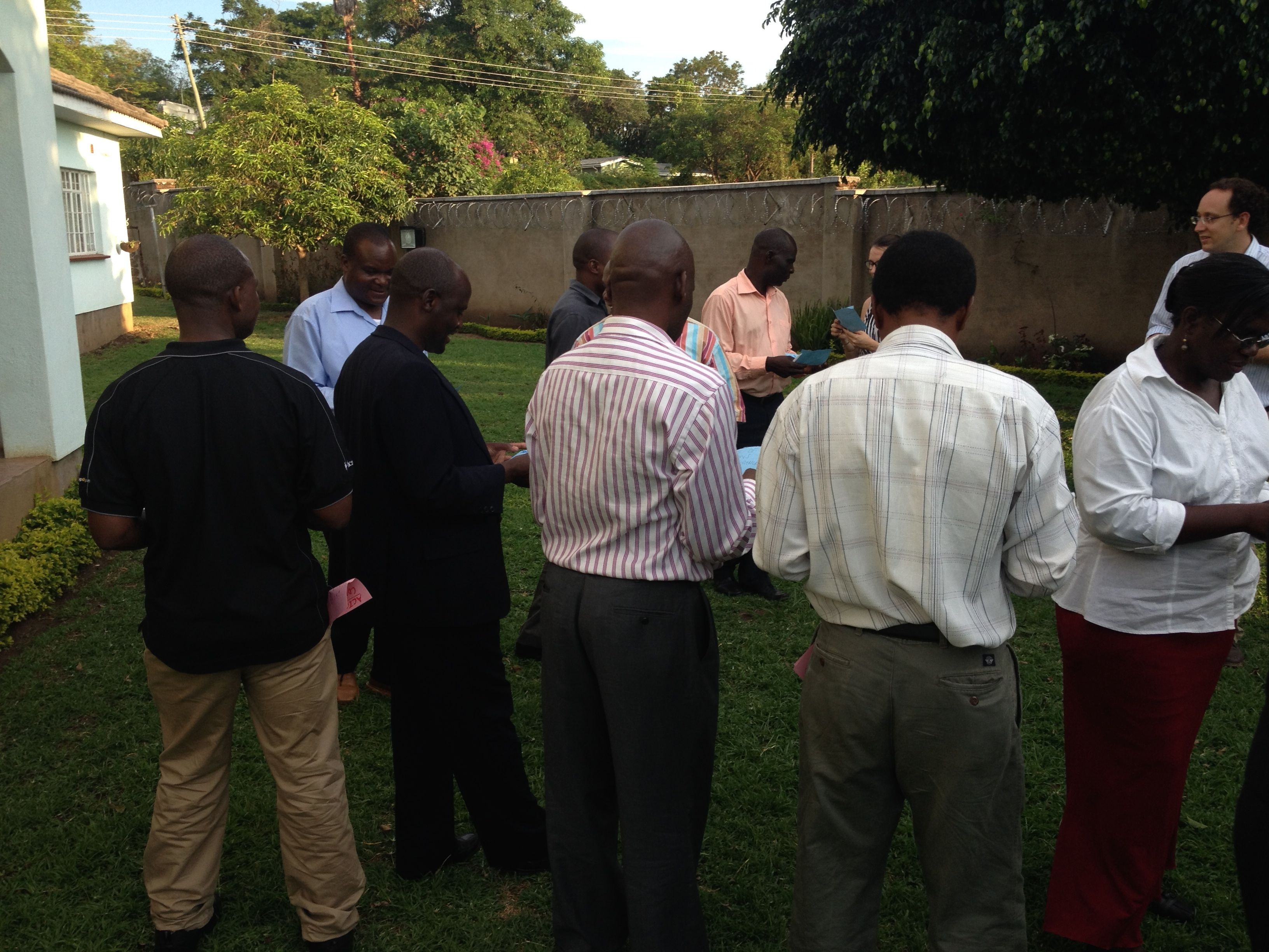 Adam directing participants on the brainstorm & ranking exercise used at the end of the first day